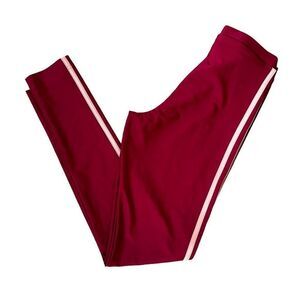 Nike burgundy pants with pink side stripe